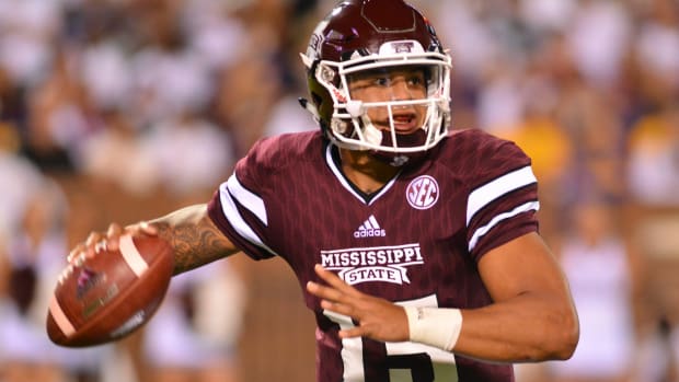 Mississippi State Bulldogs quarterback Dak Prescott (15) drops back to pass during the 2nd quarter of the game against the LSU Tigers at Davis Wade Stadium. 